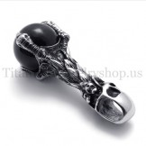 skull holding a black gem pure titanium pendant 20081