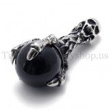 skull holding a black gem pure titanium pendant 20081